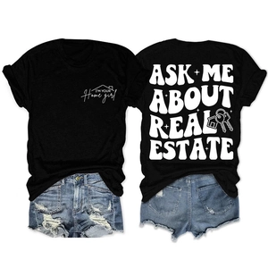 Détails avant et arrière du t-shirt noir pour l'immobilier avec imprimés graphiques