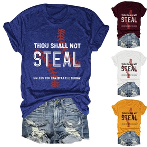 Detail view of four colorful T-shirts with baseball slogans and distressed denim shorts