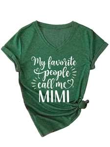 Close-up of V-neck heather green T-shirt with My Favorite People Call Me MIMI print