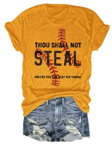 Detail view of mustard yellow baseball T-shirt with vintage slogan and denim shorts