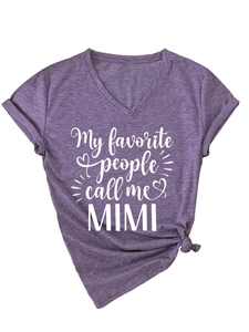 Detail of purple V-neck T-shirt with My favorite people call me MIMI print and knot hem