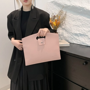 Pink minimalist faux leather tote bag for women with laptop sleeve and modern handle