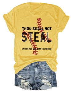 Detail of yellow round neck T-shirt with baseball print and distressed denim shorts