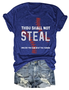 Flat lay of navy baseball slogan t-shirt tucked into frayed denim shorts