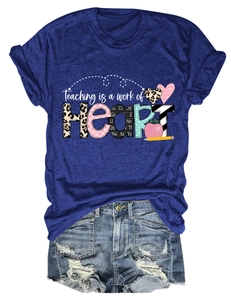 Detail of Teaching is a work of HEART print on navy blue t-shirt with leopard textures