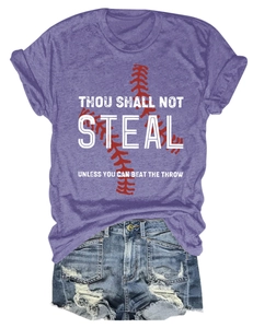 Flat lay of purple short sleeve t-shirt with baseball graphic and denim shorts
