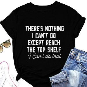 Detail of black crew neck T-shirt featuring a white slogan and stylish knotted hem design