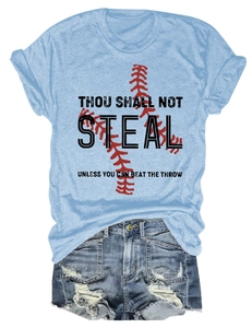 Flat lay of light blue baseball graphic tee paired with distressed denim shorts set