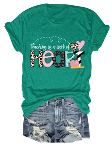 Detail of Teaching is a work of HEART print on vibrant green cotton T-shirt