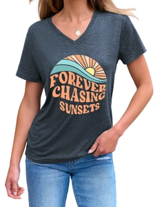 Close-up of charcoal gray V-neck tee with Forever Chasing Sunsets graphic and retro sun print