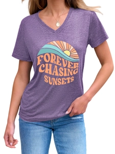 Close-up of purple V-neck T-shirt with Forever Chasing Sunsets graphic and heather texture