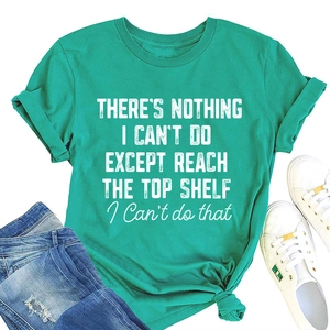 Detail of teal crew neck t-shirt featuring white slogan print and stylish front hem knot
