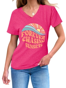 Close-up of Forever Chasing Sunsets graphic on rose pink V-neck cotton t-shirt