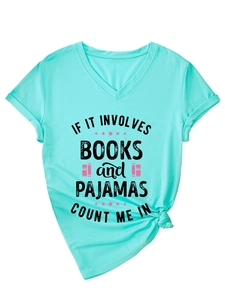 Detail of V-neck mint green t-shirt featuring book theme print and stylish side knot