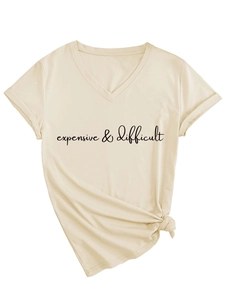 Detail of V-neck T-shirt showing knotted hem and 'expensive & difficult' print