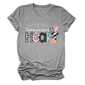 Detail of Teaching is a work of Heart graphic print with leopard pattern on grey t-shirt