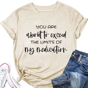 Detail view of cotton slogan tee featuring You are about to exceed my medication print