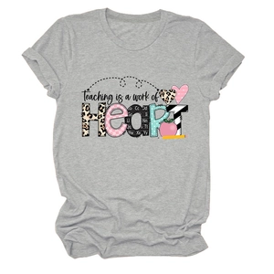 Close-up of Teaching is a work of Heart artistic print on grey cotton t-shirt