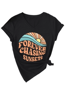 Detail of V-neck T-shirt featuring 'Forever Chasing Sunsets' print and stylish hem knot