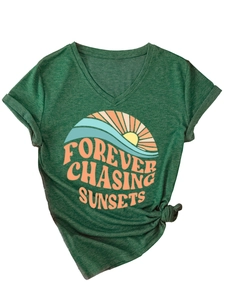Detail of V-neck T-shirt showing forever chasing sunsets print and side knot hem