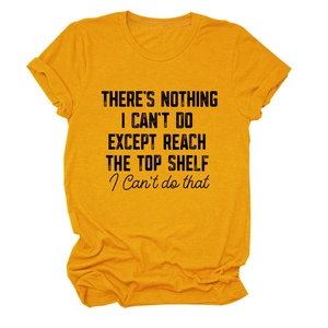 Detail of ginger yellow cotton t-shirt featuring a humorous black printed slogan on fabric