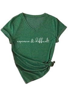 Detail of dark green V-neck T-shirt with expensive & difficult text and knotted hemline