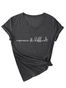 Close-up of charcoal gray V-neck T-shirt with white expensive difficult print and knotted hem