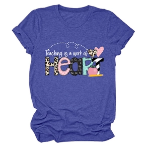 Detail of Teaching is a work of HEART graphic print on a royal blue short sleeve T-shirt