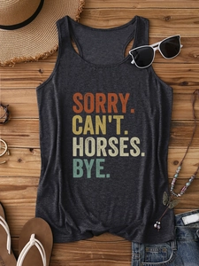 Flat lay of gray racerback tank top with SORRY CAN'T HORSES BYE text and summer props