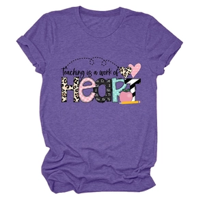 Detail of purple heather T-shirt featuring Teaching is a work of HEART teacher graphic