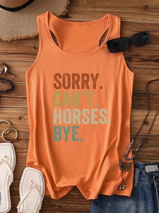 Flat lay of an orange racerback tank top with Sorry Can't Horses Bye text and summer accessories