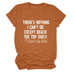 Close-up of burnt orange crew neck t-shirt featuring vintage slogan print and soft texture