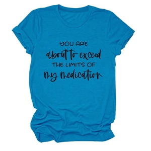Detail of round neck and black slogan print on bright blue cotton short sleeve T-shirt