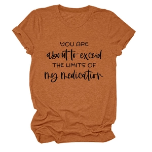 Detail of caramel t-shirt featuring black YOU ARE about to exceed slogan print