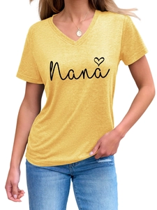 Detail of yellow V-neck T-shirt with black Nana script and small heart print