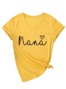 Detail of yellow V-neck T-shirt featuring Nana heart print and stylish knotted hem