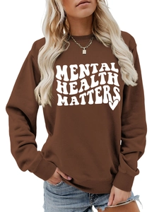 Detail of Mental Health Matters print on brown long sleeve cotton sweatshirt