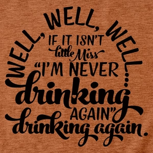 Close-up of funny quote print on burnt orange cotton fabric of the casual t-shirt