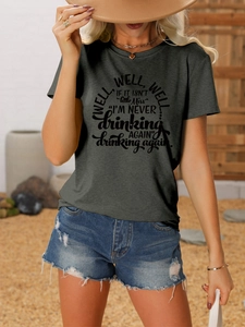 Detail of dark grey crew neck T-shirt with black art text paired with denim shorts