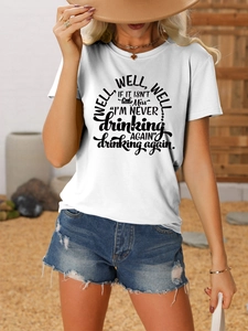 Detail of white cotton crew neck T-shirt with humorous black graphic lettering