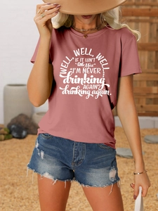 Detail of dusty rose casual T-shirt featuring white letter print and round neckline