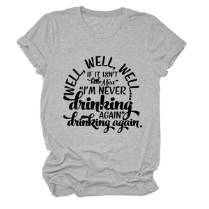 Detail of grey crewneck t-shirt featuring 'Well well well' typography on cotton fabric