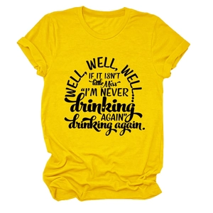 Detail of yellow cotton T-shirt with well well well if it print and cuffed sleeves