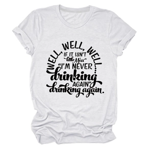 Macro detail of 'Well Well Well' printed slogan on white crewneck short sleeve t-shirt