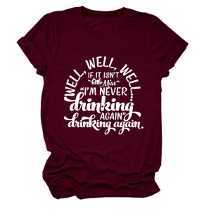 Close-up of white graphic text on a burgundy cotton crew neck short sleeve T-shirt