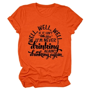 Close-up of well well well if it print on an orange cotton crew neck t-shirt detail