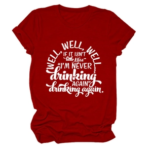 Detail of red crew neck T-shirt featuring bold white 'well well well' artistic text