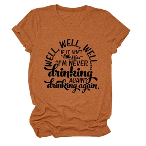 Close-up of the burnt orange crew neck T-shirt with vintage black artistic text print