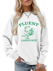 Détail du sweat blanc avec imprimé de coq vert et slogan humoristique original