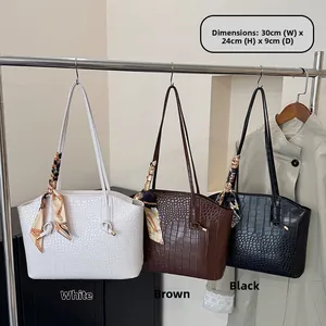 Crocodile texture tote bags in white, brown, and black with silk scarf handles
